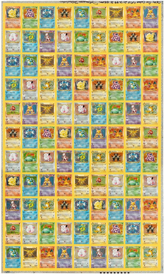 Uncut sheet of rare first-edition Pokémon cards, including two